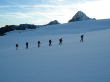 A roped party departing