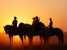 Riders at sunset