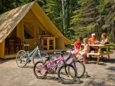 Bikes and tent of the park Pointe Taillon