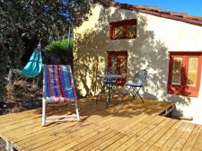 The gîte terrace, made of recycled wood