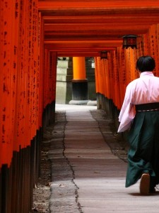 The famous red torii at Fushimi Inari shinto sanctuary in Tokyo